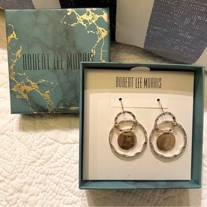 Robert Lee Morris pierced earrings.